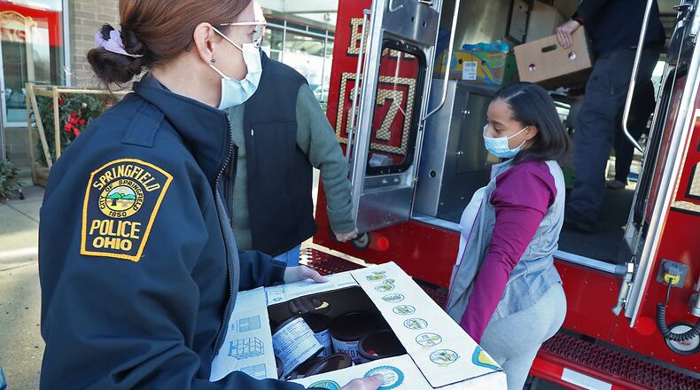The Clark State College Criminal Justice Club will partner with the Springfield Police Division and Meijer for this year's Operation Thanksgiving program on Tuesday. BILL LACKEY/STAFF
