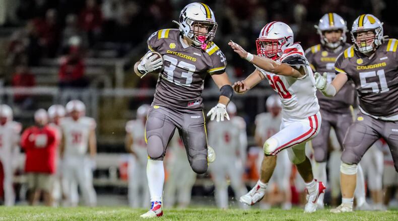 Kenton Ridge High School Jackson Patton runs past a London defender during their game earlier this season at Richard L. Phillips Field in Springfield. CONTRIBUTED PHOTO BY MICHAEL COOPER