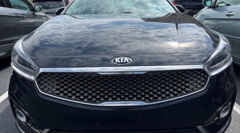 A Kia parked in a parking lot in Dayton. CORNELIUS FROLIK / STAFF