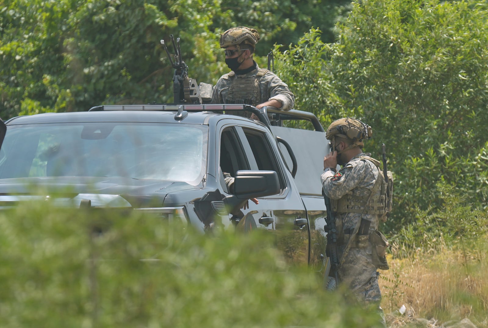 PUK forces including Asayish, SWAT and Asayish guard the Jasana Cave in Sulaymaniyah governorate, Iraq, Friday, July 11, 2025. (AP Photo/Hadi Mizban)