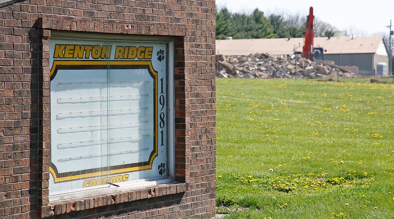 All that remains of the former Kenton Ridge High School is a pile of rubble Monday, April 15, 2024. The high school, located on Middle Urbana Road, was recently demolished. A new combined Kenton Ridge School was opened at the beginning of this school year. BILL LACKEY/STAFF