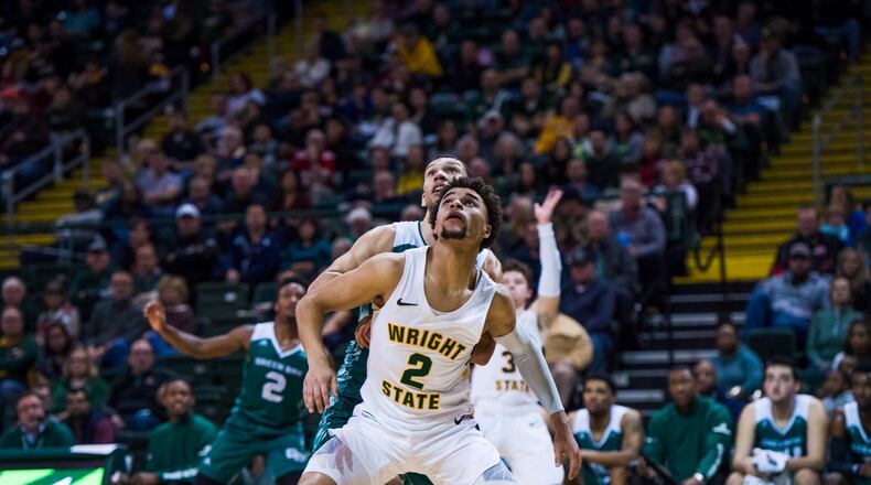 Wright State’s Tanner Holden blocks out a Green Bay defender at the Nutter Center on Dec. 28, 2019. Joseph Craven/WSU Athletics