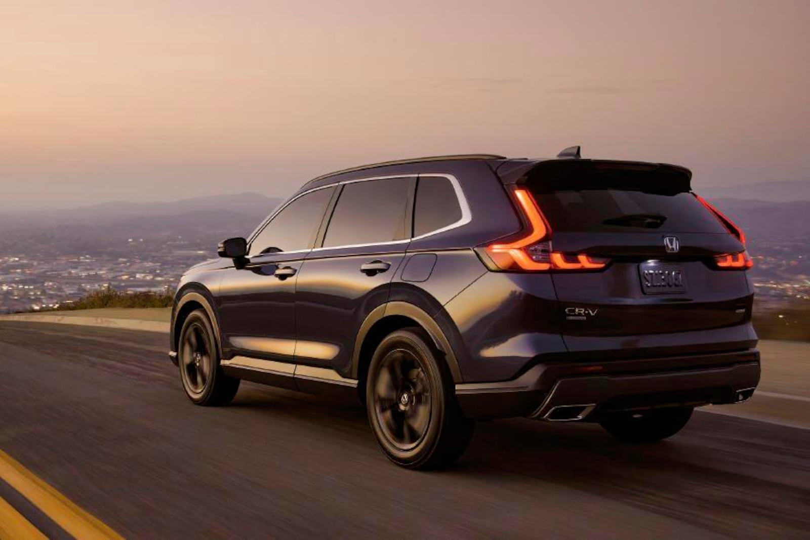 This photo provided by Honda shows the 2025 CR-V. The CR-V is a standout small SUV thanks to its ample interior space and an appealing mix of features for your money. (Courtesy of American Honda Motor Co. via AP)