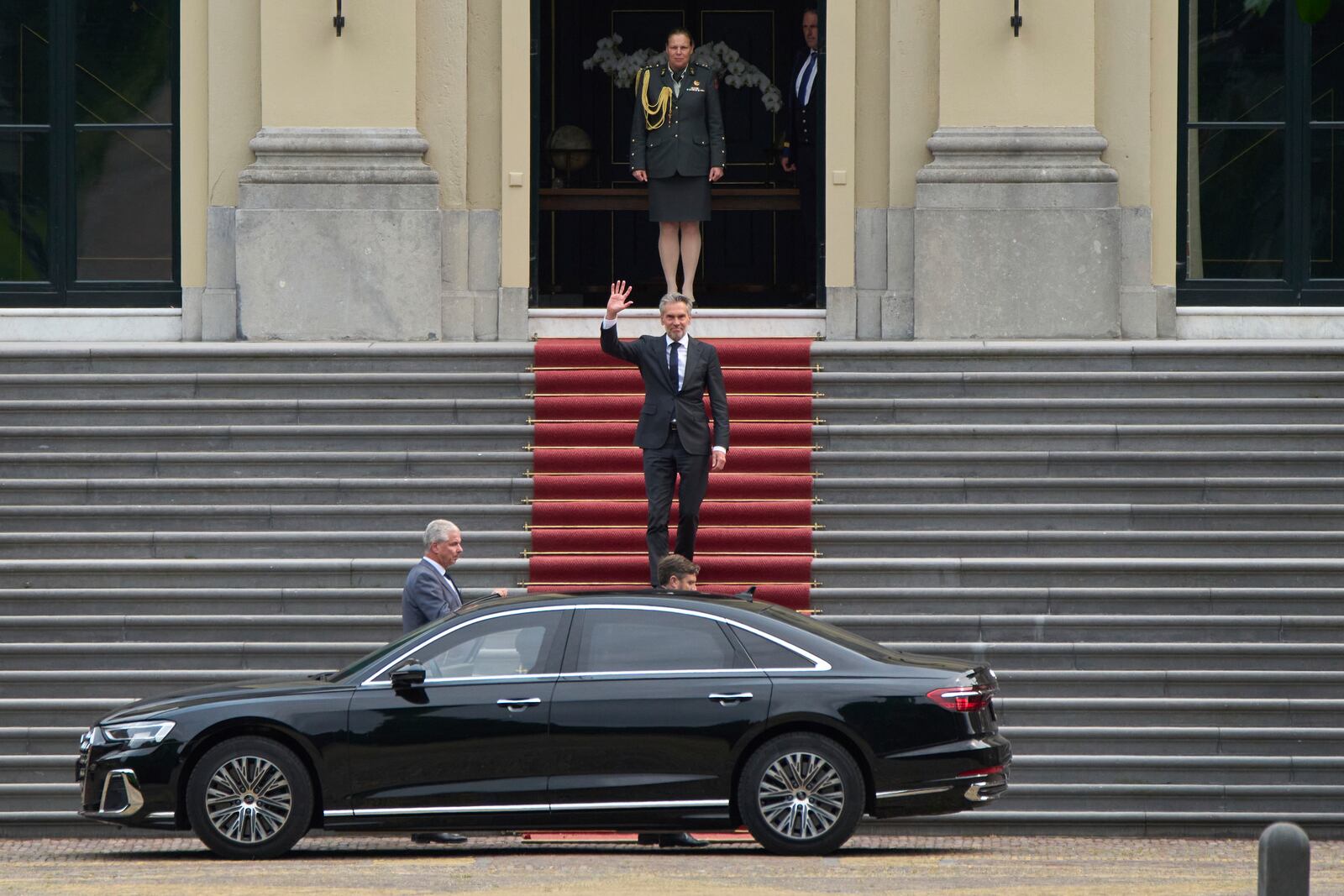 Dutch Prime Minister Dick Schoof waves after handing in the resignation of Geert Wilder's PVV party ministers to King Willem-Alexander at royal palace Huis ten Bosch in The Hague, Netherlands, Tuesday, June 3, 2025. (AP Photo/Peter Dejong)