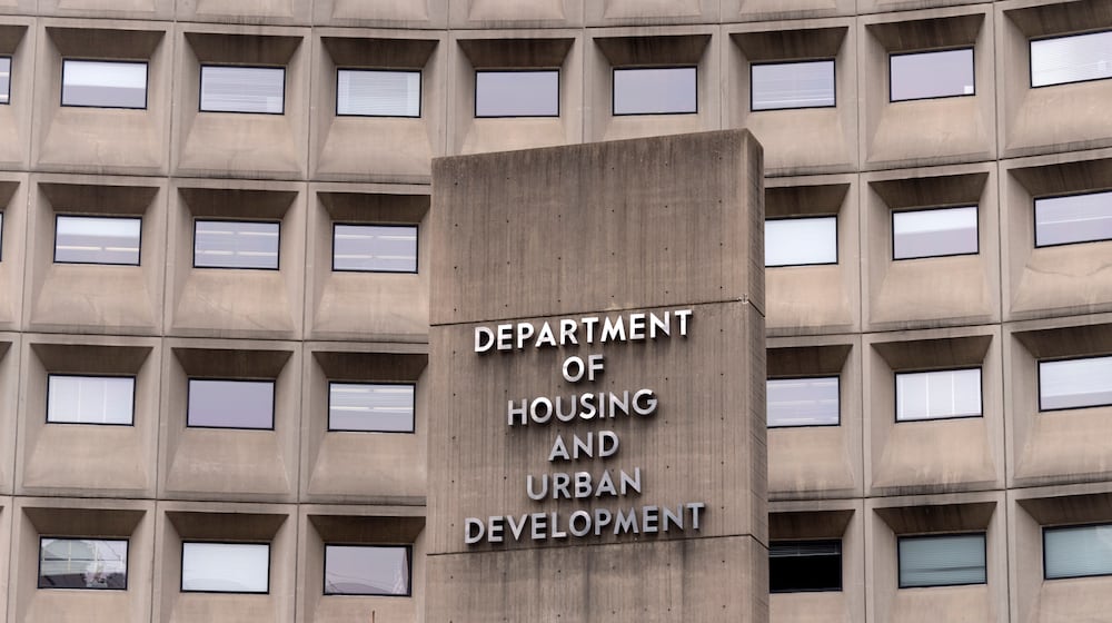 FILE - A sign for the Department of Housing and Urban Development stands outside the agency's headquarters, Jan. 16, 2026, in Washington. (AP Photo/Mark Schiefelbein, File)