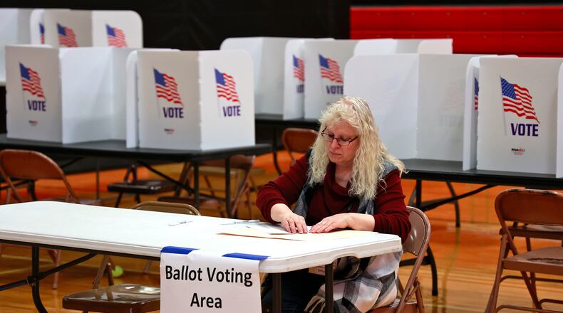 New Carlisle resident Theresa Leavitt casts her vote Tuesday, May 2, 2023, at Tecumseh High School. BILL LACKEY/STAFF