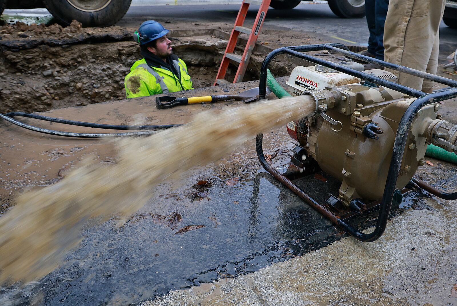 The City of Springfield Water Department spent the afternoon Wednesday, Dec. 4, 2024 repairing a water main break on East Northern Avenue. Over $100 million has been spent over the last five years to improve infrastructure for water/sewer/stormwater utilities, and as a result, city residents will see rate increases in both 2025 and 2026. BILL LACKEY/STAFF