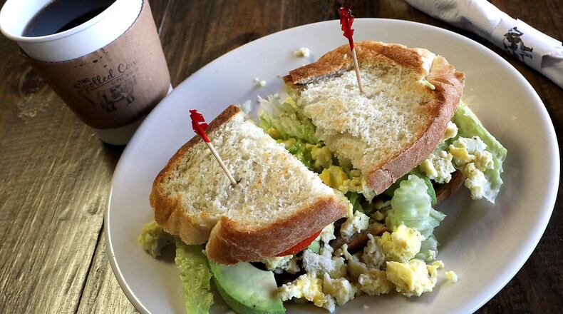 The “Sunrise Sandwich” at The Spotted Cow Coffee House. BILL LACKEY/STAFF
