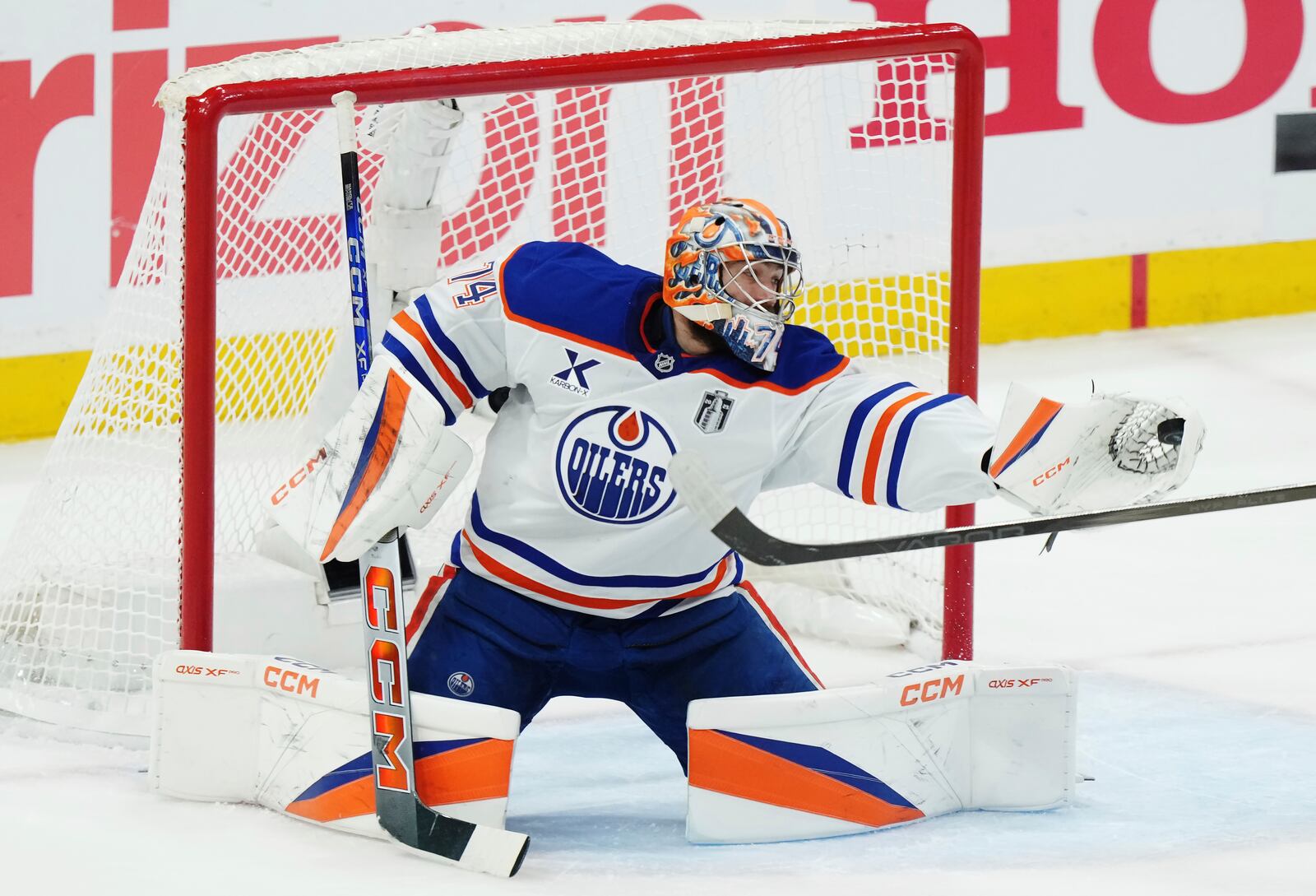 Edmonton Oilers goalie Stuart Skinner makes a save against the Florida Panthers during the first period in Game 4 of the NHL hockey Stanley Cup Final in Sunrise, Fla., Thursday, June 12, 2025. (Nathan Denette/The Canadian Press via AP)