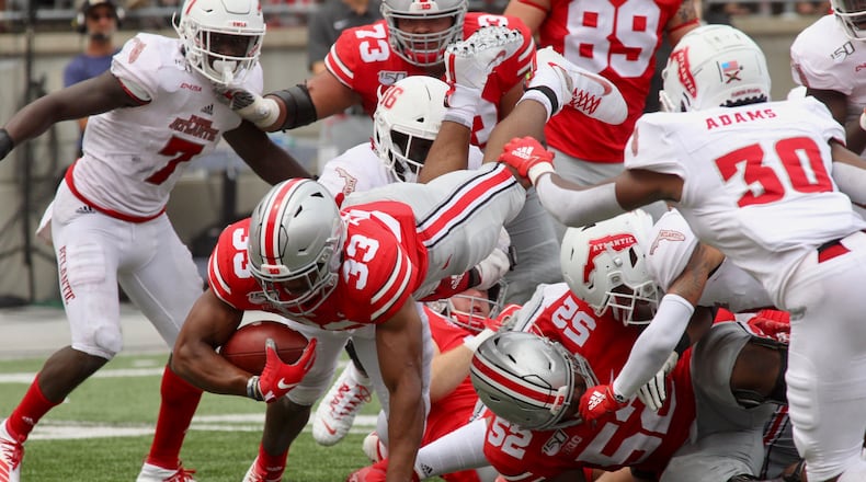 Ohio State’s Master Teague runs against Florida Atlantic on Saturday, Aug. 31, 2019, at Ohio Stadium in Columbus. David Jablonski/Staff