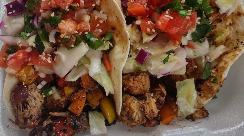 Kahuna Grindz, a food truck specializing in authentic Hawaiian cuisine, is opening a brick-and-mortar location at 645 W. Second St. in Xenia. CONTRIBUTED PHOTO