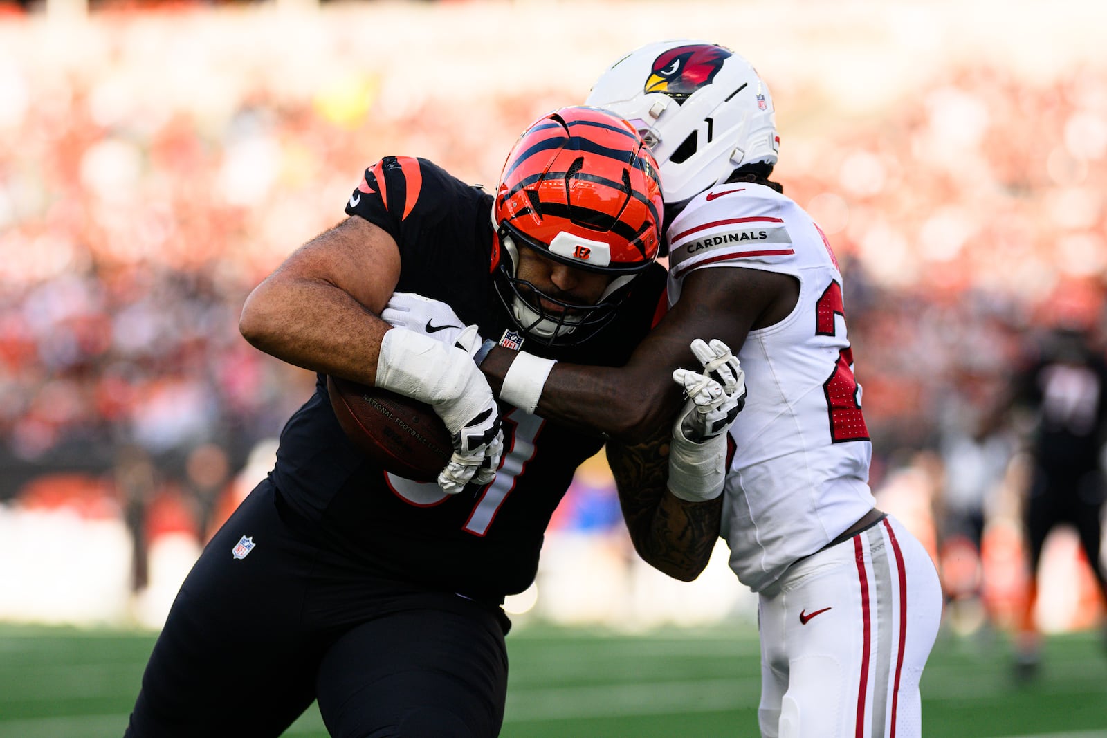 Bengals offensive lineman Cody Ford completes a catch and run in the third quarter during their game against the Arizona Cardinals on Sunday, Dec. 28, at Paycor Stadium. JEREMY MILLER / CONTRIBUTED PHOTO