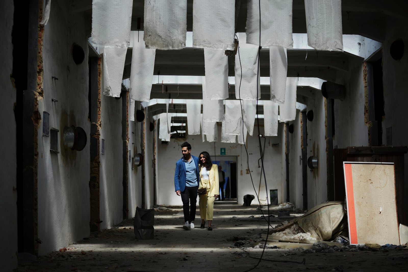 Visitors observe the Museum of Survivors, located in a factory where Oskar Schindler saved some 1200 Jews during the WWII, in Brnenec, Czech Republic, Saturday, May 10, 2025. (AP Photo/Petr David Josek)