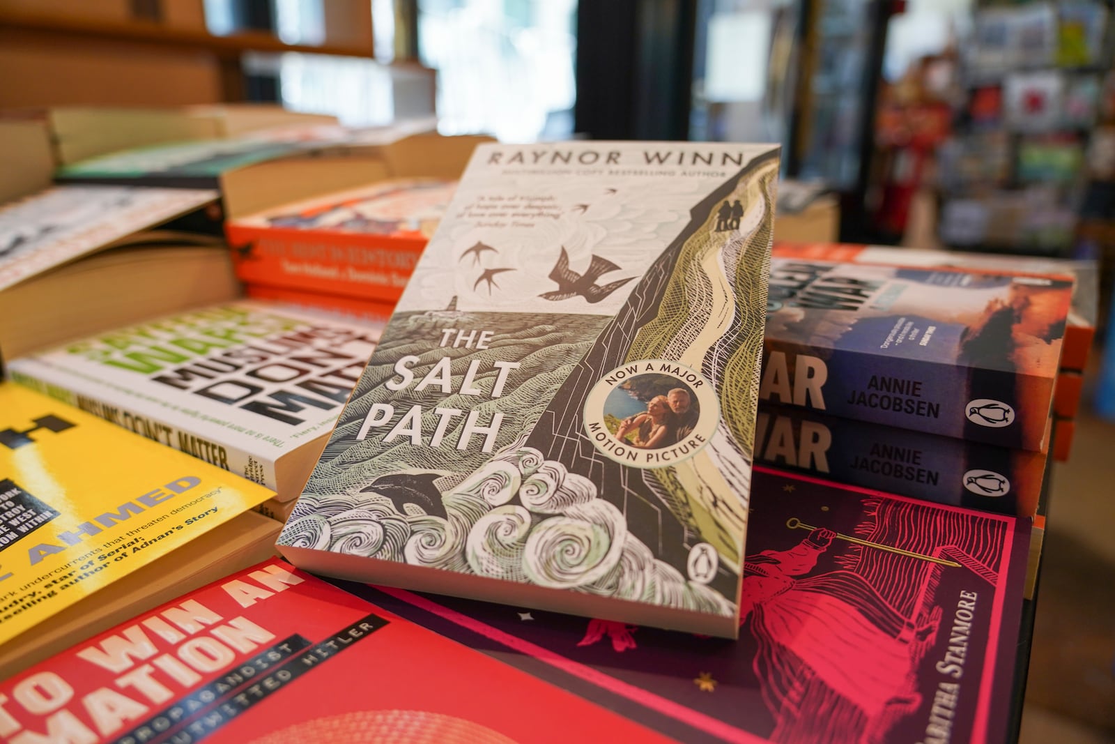 A copy of "The Salt Path", by Raynor Winn is on display in a book store, in London, Friday, July 11, 2025. (AP Photo/Alberto Pezzali)