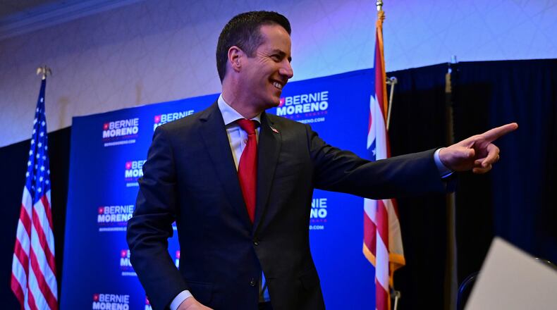 Cleveland businessman Bernie Moreno, a Republican candidate for U.S. Senate points to the crowd during his primary election night watch party in Westlake, Ohio, Tuesday, March 19, 2024. (AP Photo/David Dermer)