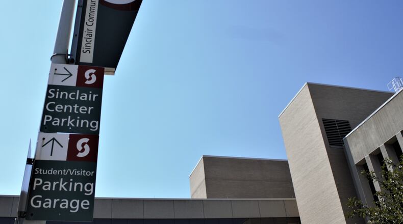 Fourteen students will be able to go to college for free at Sinclair because of General Motors scholarship.