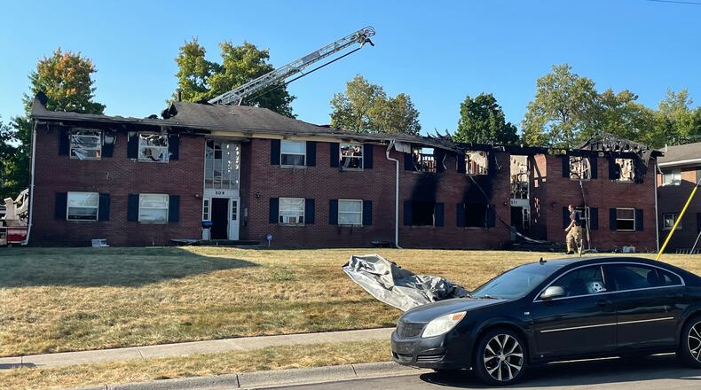 Two people were injured when an early morning fire heavily damaged an eight-unit apartment building Sunday, Sept. 15, 2024 at 509-511 West Third Street across from Snowhill Elementary School in Springfield. SYDNEY DAWES / STAFF