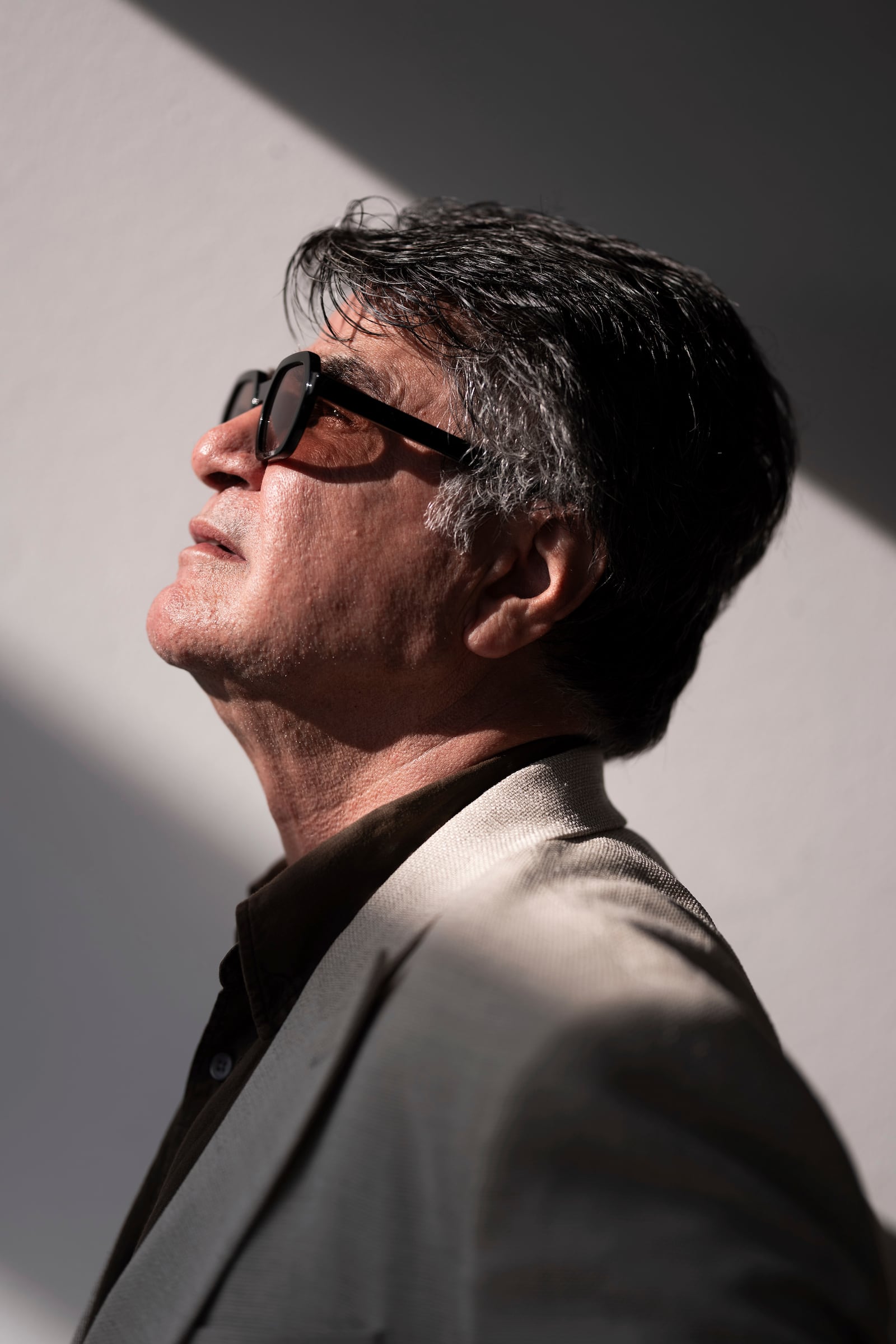 Director Jafar Panahi poses for a portrait photograph for the film 'It Was Just an Accident' at the 78th international film festival, Cannes, southern France, Wednesday, May 21, 2025. (Photo by Scott A Garfitt/Invision/AP)