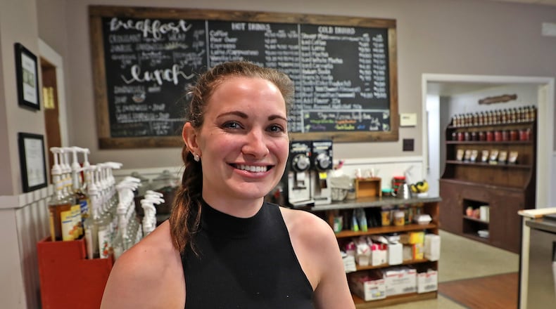 Bobbi Custer and The Spotted Cow Coffeehouse in Urbana were recently recognized by the state for providing a workplace for individuals with special needs. BILL LACKEY/STAFF