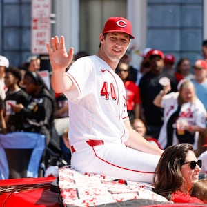 Former Cincinnati Reds catcher Johnny Bench signals to the crowd as during the 107th Findlay Market Opening Day Parade on March 26, 2026. NICK GRAHAM/STAFF