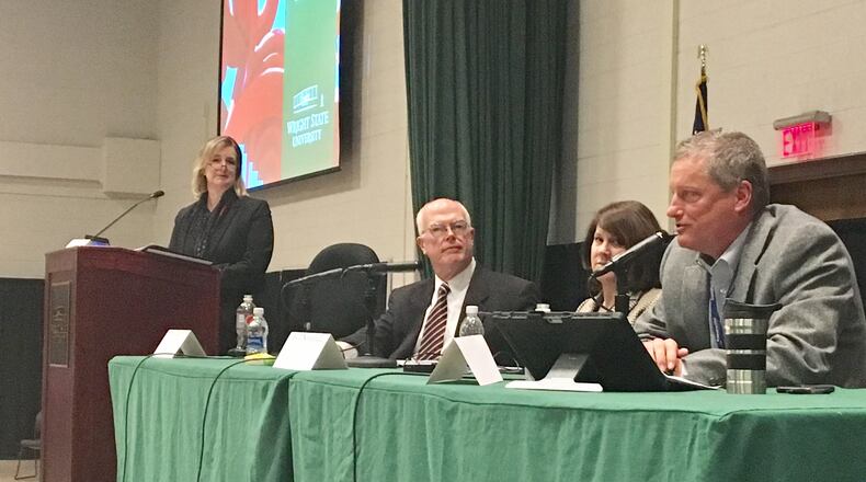 Wright State board of trustees chairman Doug Fecher speaks during a community forum on the university’s budget in January. University trustees slashed more than $30.8 million from the school’s budget in June 2017.