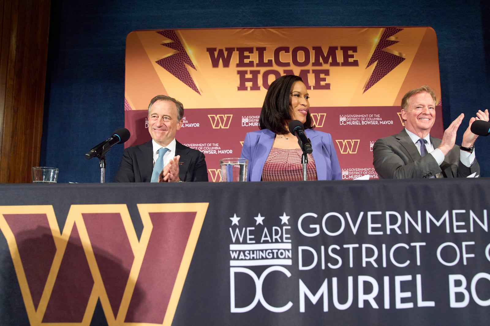 Washington Commanders controlling owner Josh Harris, from left, District of Columbia Mayor Muriel Bowser and NFL Commissioner Roger Goodell announce a new home for the NFL football team on the site of the old RFK Stadium, Monday, April 28, 2025, at the National Press Club in Washington. (AP Photo/Jacquelyn Martin)