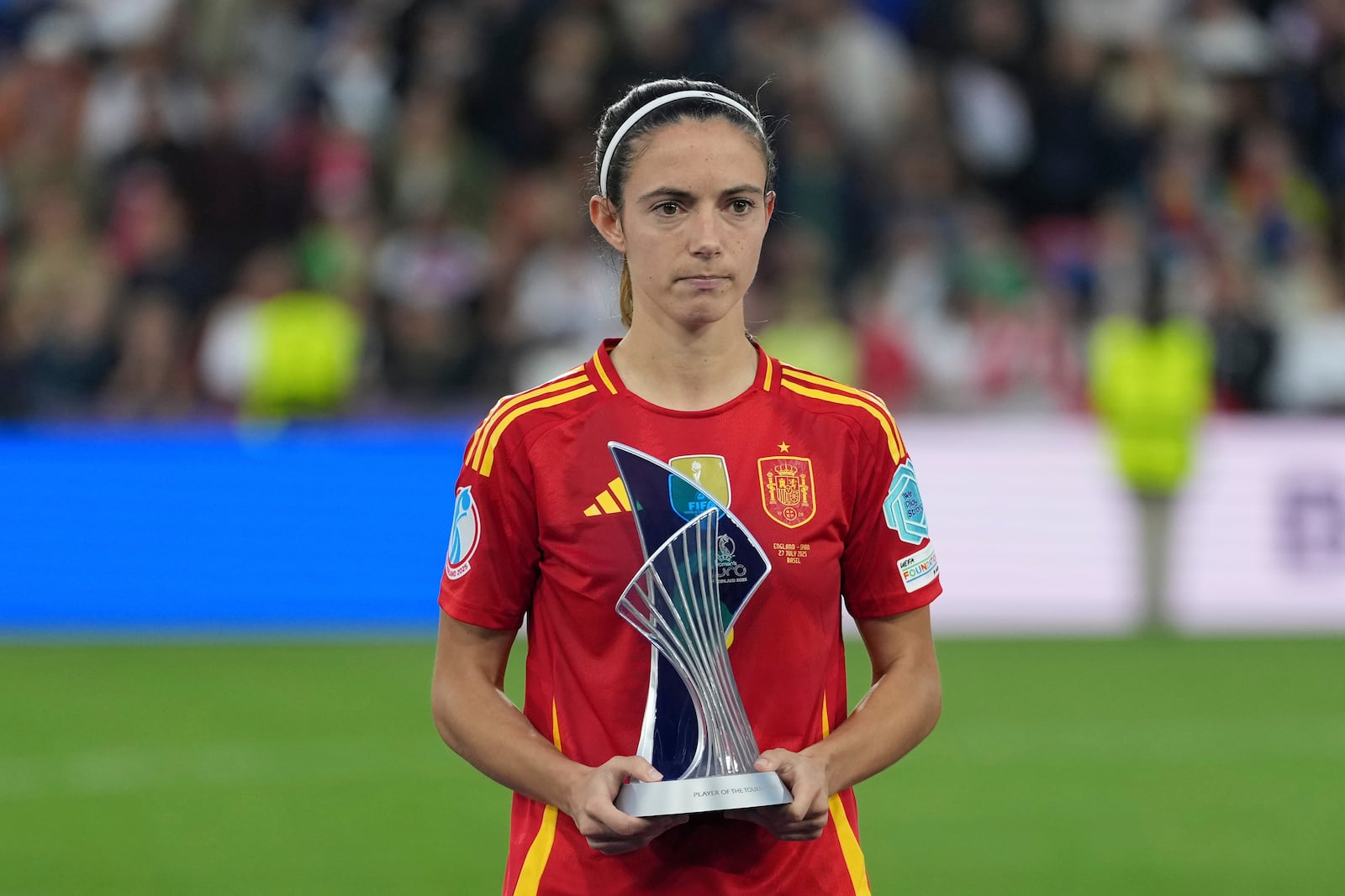 Spain's Aitana Bonmati poses with most valuable player trophy after the Women's Euro 2025 final soccer match between England and Spain at St. Jakob-Park in Basel, Switzerland, Sunday, July 27, 2025. (AP Photo/Martin Meissner)