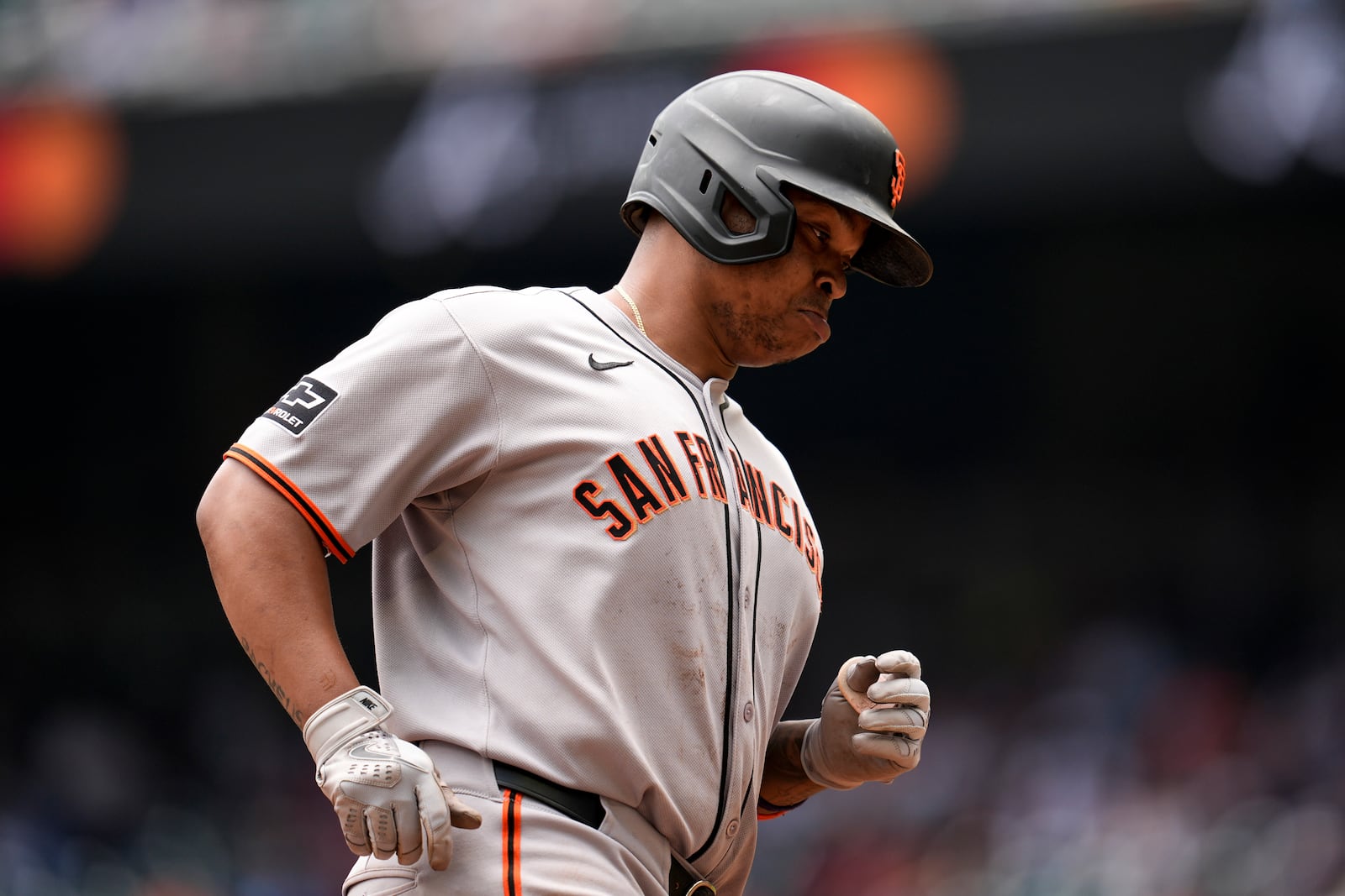 San Francisco Giants designated hitter Rafael Devers (16) rounds the bases after hitting a three-run home run against the Atlanta Braves in the sixth inning of a baseball game, Wednesday, July 23, 2025, in Atlanta. (AP Photo/Mike Stewart)