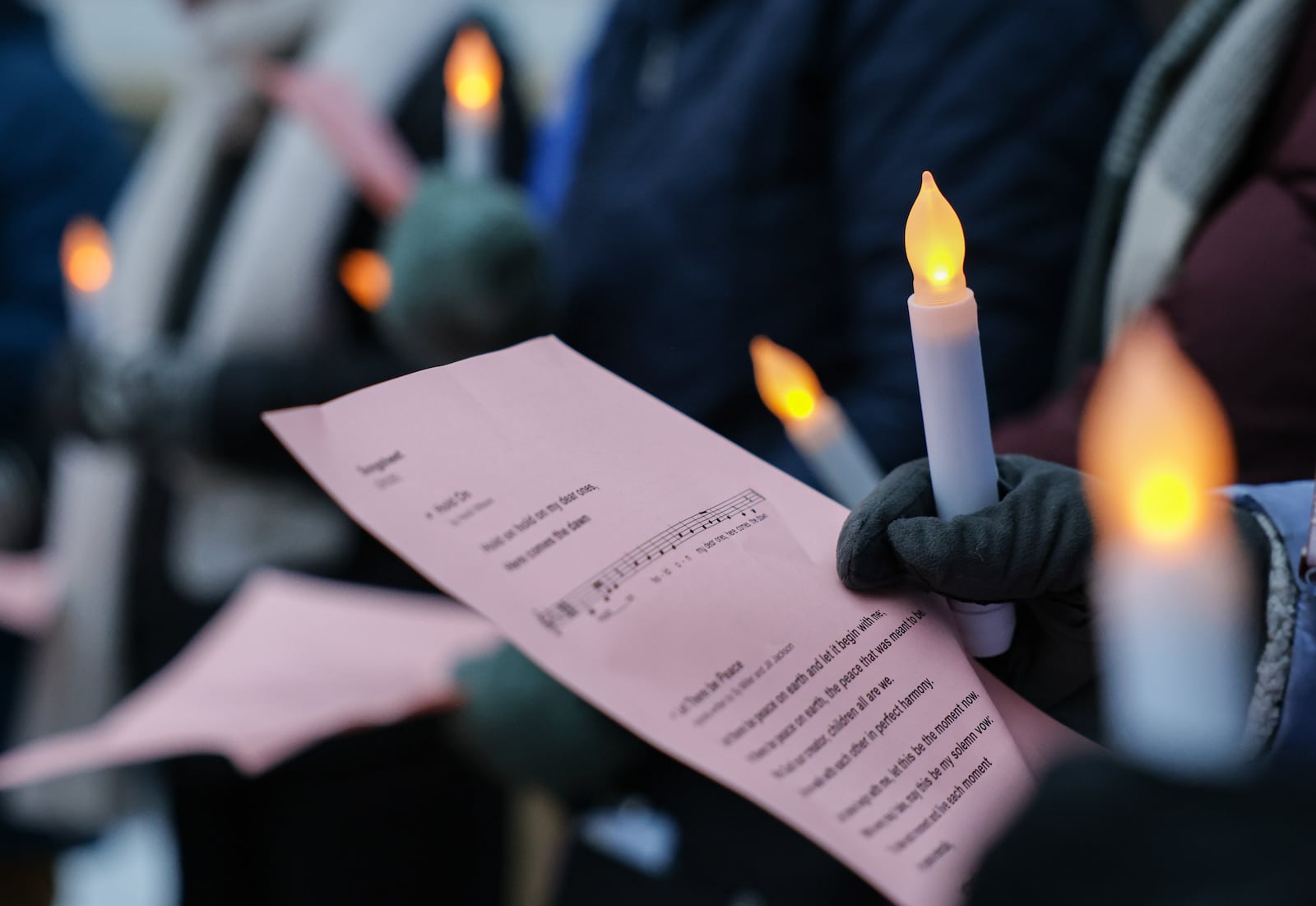 Springfield Neighbors United held a candlelight remembrance vigil on Friday, Feb. 6 at Esplanade Fountain Square for community members who have been "detained, deported or disappeared." The group holds a vigil on the first Friday of each month. Friday's vigil came at the end of the challenging week for the organization, but leaders say they were thrilled a judicial order preventing Temporary Protective Status of Haitian immigrants from expiring. BRYANT BILLING / STAFF