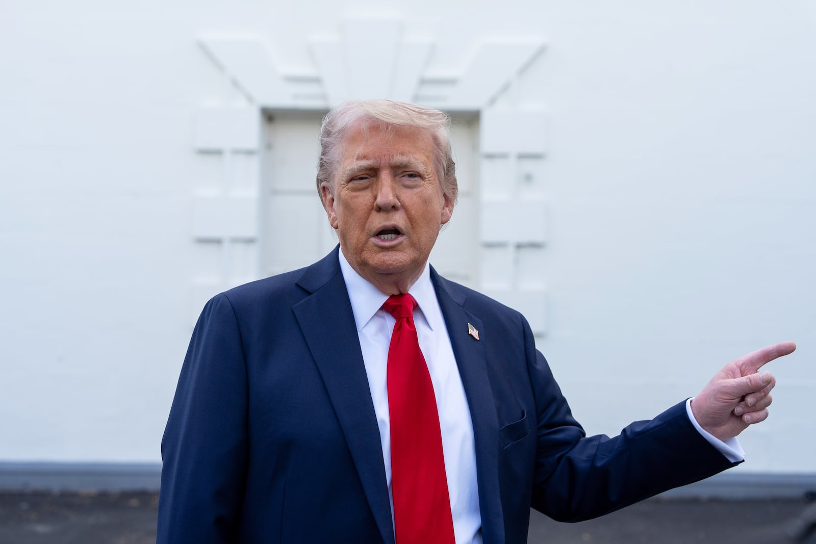 President Donald Trump speaks with reporters at the White House, Wednesday, April 23, 2025, in Washington. (AP Photo/Alex Brandon)