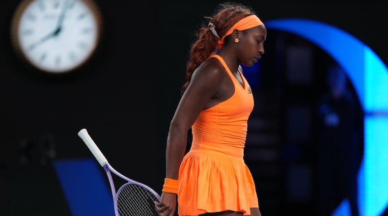 Coco Gauff of the U.S. reacts during her quarterfinal match against Elina Svitolina of Ukraine during their quarterfinal match at the Australian Open tennis championship in Melbourne, Australia, Tuesday, Jan. 27, 2026. (AP Photo/Dita Alangkara)