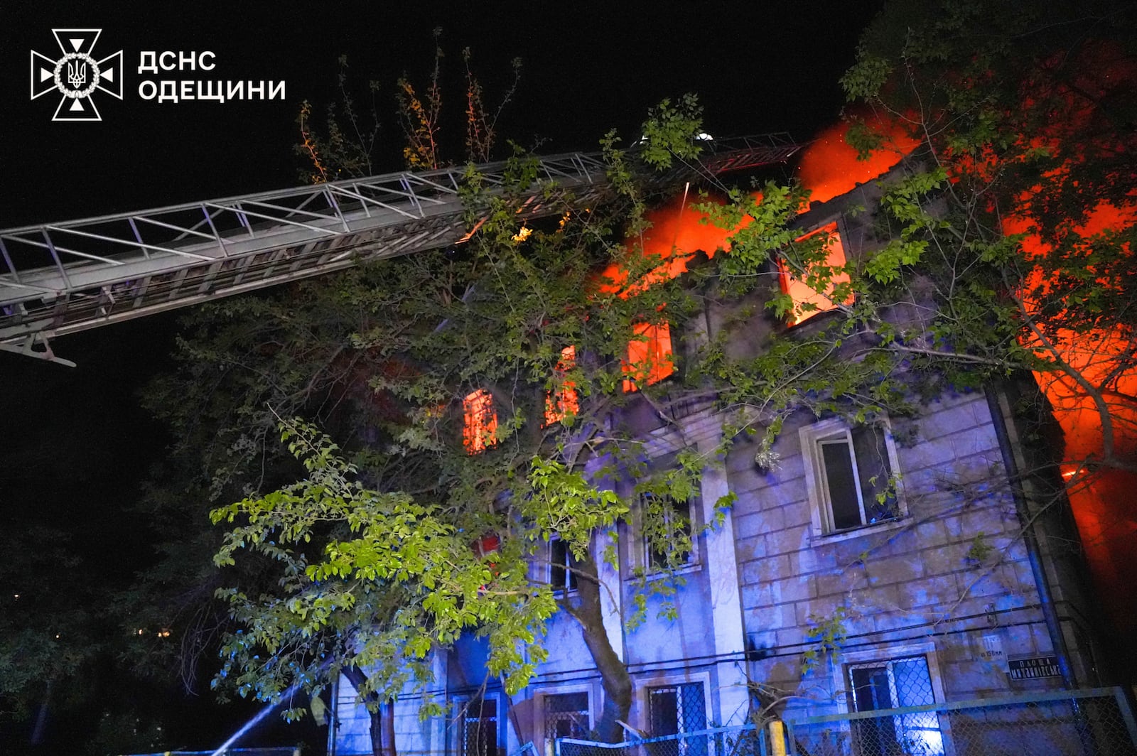 In this photo provided by the Ukrainian Emergency Service, firefighters put out the fire at an apartment house following Russia's air raid in Odesa, Ukraine, Thursday, May 1, 2025. (Ukrainian Emergency Service via AP)
