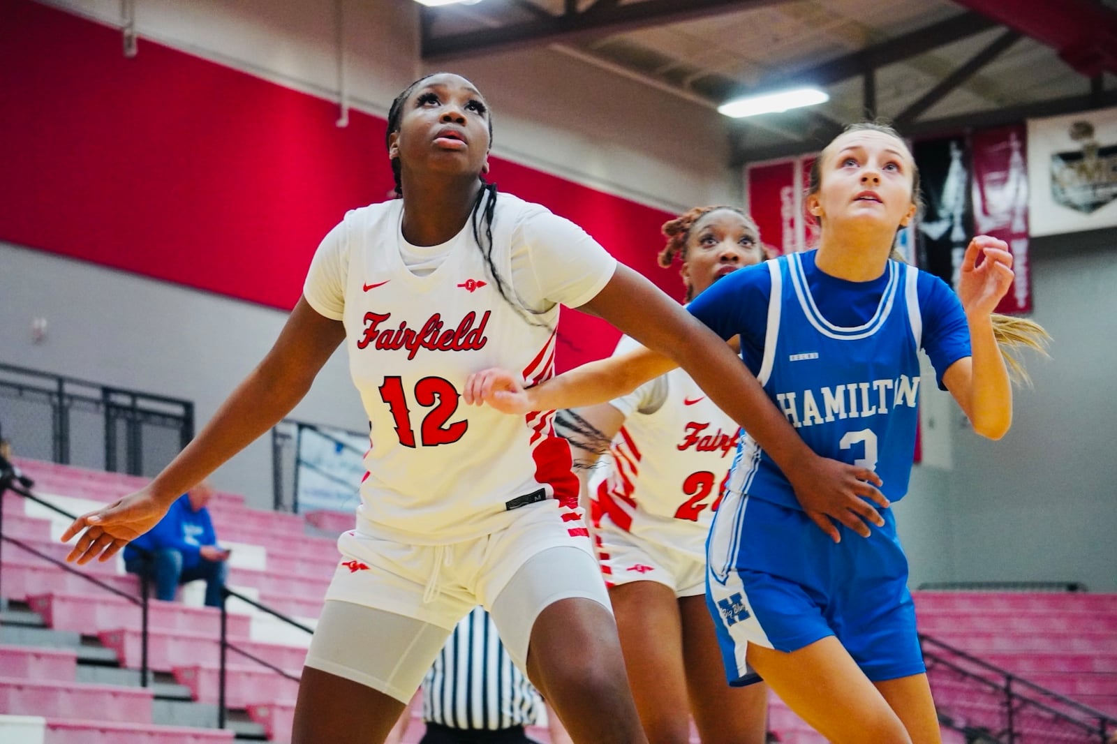 Fairfield junior Kobi Crim boxes out Hamilton junior Brookelyn Murrell (3) during their game last February at Fairfield Arena. CHRIS VOGT / CONTRIBUTED