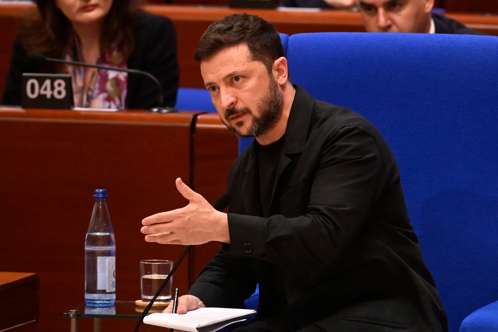 Ukraine's President Volodymyr Zelenskyy delivers a speech at the Council of Europe after signing the legal instruments necessary to launch the Special Tribunal for the Crime of Aggression against Ukraine, in Strasbourg, eastern France, Wednesday, June 25, 2025. (AP Photo/Pascal Bastien)