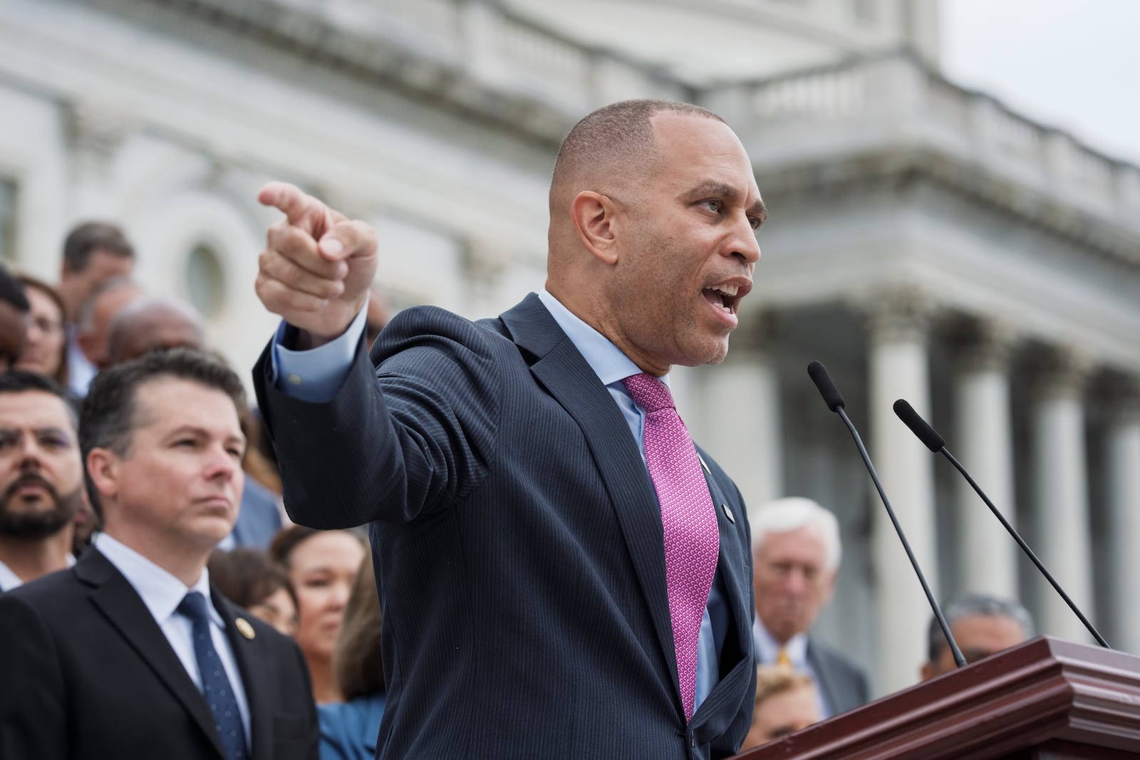 House Minority Leader Hakeem Jeffries, D-N.Y., and the Democratic Caucus, assemble on the steps of the Capitol to condemn President Donald Trump's signature bill of tax breaks and spending cuts, in Washington, Wednesday, July 2, 2025. (AP Photo/J. Scott Applewhite)