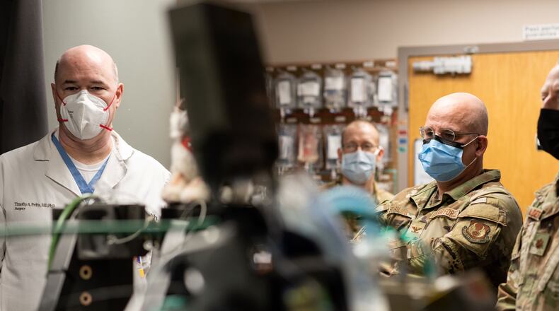 From left to right: Dr. Timothy Pritts, division chief of general surgery and vice chair of clinical operations at UC Health and professor in the Department of Surgery at the UC College of Medicine works with US Air Force personnel on site at UC Medical Center. UC Health photo