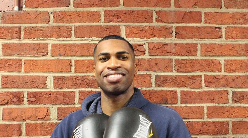 Staff Sgt. Christopher Kemp, a medical technician in the Maternal Childcare Flight, Inpatient Operations Squadron, 88th Medical Group, Wright-Patterson Air Force Base, trains Feb. 3 at the Brown Institute of Martial Arts for an upcoming bout. Kemp was on the All Air-Force boxing team in 2014. (Contributed photo)