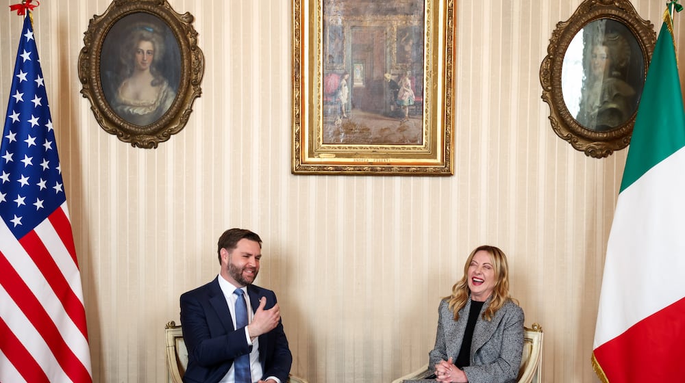 Italy's Prime Minister Giorgia Meloni, right, and US Vice President JD Vance hold a bilateral meeting during his visit to the 2026 Winter Olympics, in Milan, Italy, Friday, Feb. 6, 2026. (Kevin Lamarque/Pool Photo via AP)