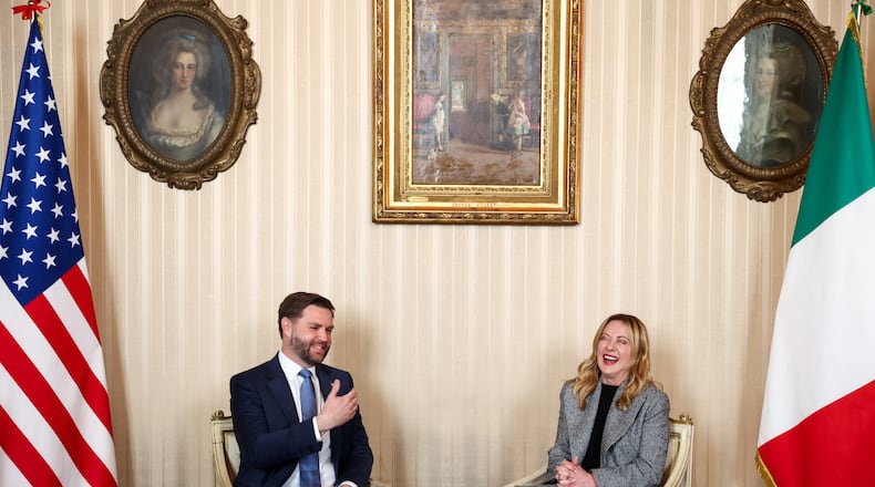 Italy's Prime Minister Giorgia Meloni, right, and US Vice President JD Vance hold a bilateral meeting during his visit to the 2026 Winter Olympics, in Milan, Italy, Friday, Feb. 6, 2026. (Kevin Lamarque/Pool Photo via AP)