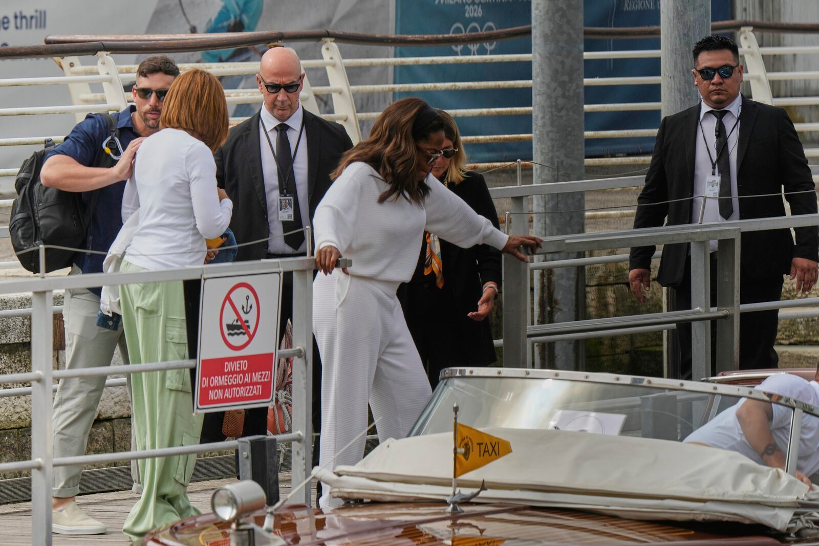 Oprah Winfrey, center, arrives for the weekend wedding of Amazon founder Jeff Bezos and Lauren Sanchez, in Venice, Italy, Thursday, June 26, 2025. (AP Photo/Luca Bruno)