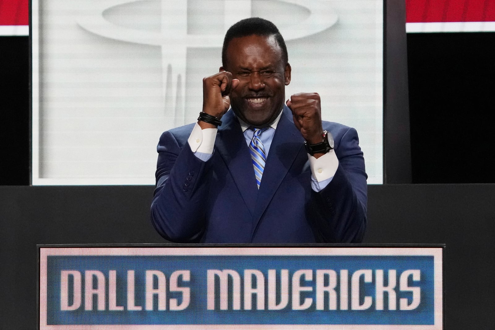 Dallas Mavericks' Rolando Blackman celebrates after NBA Deputy Commissioner Mark Tatum announced that the Mavericks won the first pick in the 2025 NBA draft during the draft lottery in Chicago, Monday, May 12, 2025. (AP Photo/Nam Y. Huh)