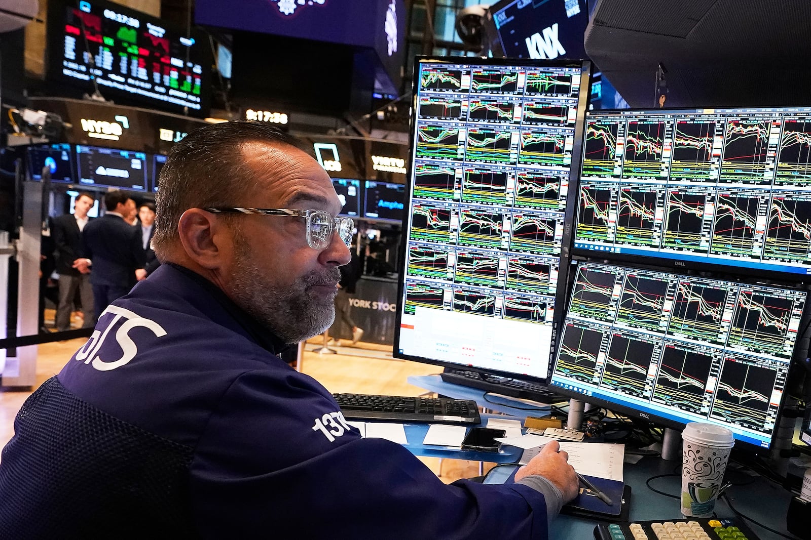 Specialist Anthony Matesic works on the floor of the New York Stock Exchange, Tuesday, May 6, 2025. (AP Photo/Richard Drew)