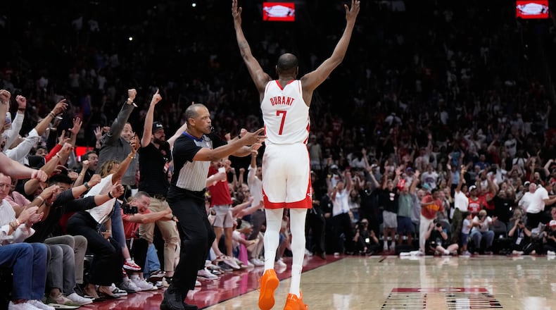 Houston Rockets forward Kevin Durant (7) reacts after winning against the Miami Heat in an NBA basketball game in Houston, Saturday, March 21, 2026. (AP Photo/Ashley Landis)