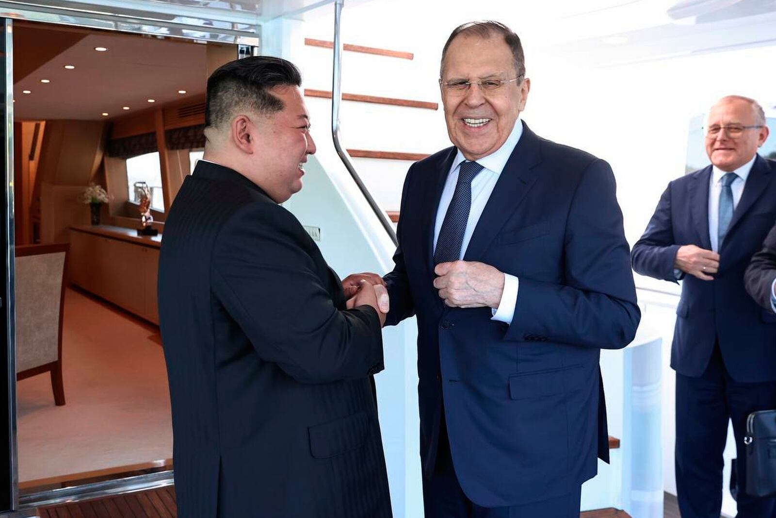 In this photo released by Russian Foreign Ministry Press Service, Russian Foreign Minister Sergey Lavrov, right, and North Korea's leader Kim Jong Un shake hands during their meeting in Wonsan, North Korea, on Saturday, July 12, 2025. (Russian Foreign Ministry Press Service via AP)