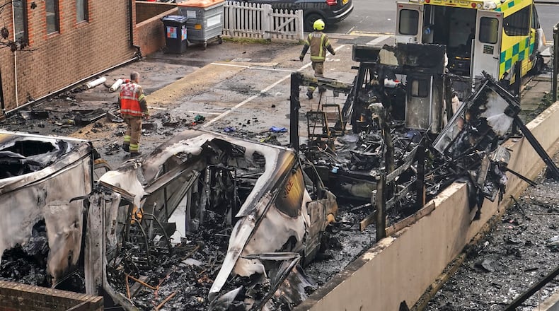 View at burnt ambulances in a car park at Golders Green in London, Monday, March 23, 2026 after an apparent arson attack on four vehicles belonging to a Jewish ambulance service, Hatzola Northwest.(AP Photo/Alberto Pezzali)