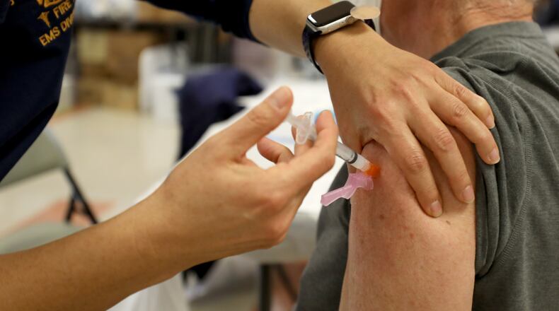 FILE — A nurse administers a coronavirus vaccine in Santa Barbara, Calif., Jan. 26, 2021. (Daniel Dreifuss/The New York Times)