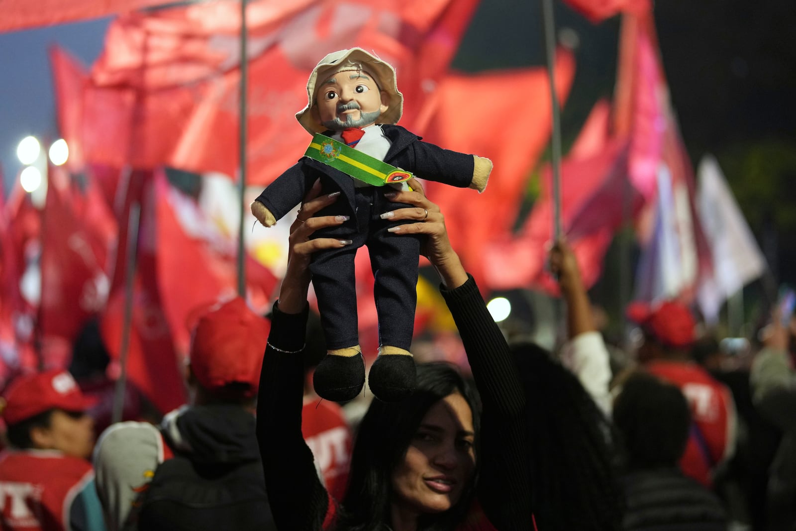 Protesters hold up a doll of Brazilian President Lula Inacio Lula da Silva during a protest against U.S. President Donald Trump's announcement of 50% tariffs on Brazilian goods, in Sao Paulo, Thursday, July 10, 2025. (AP Photo/Andre Penner)