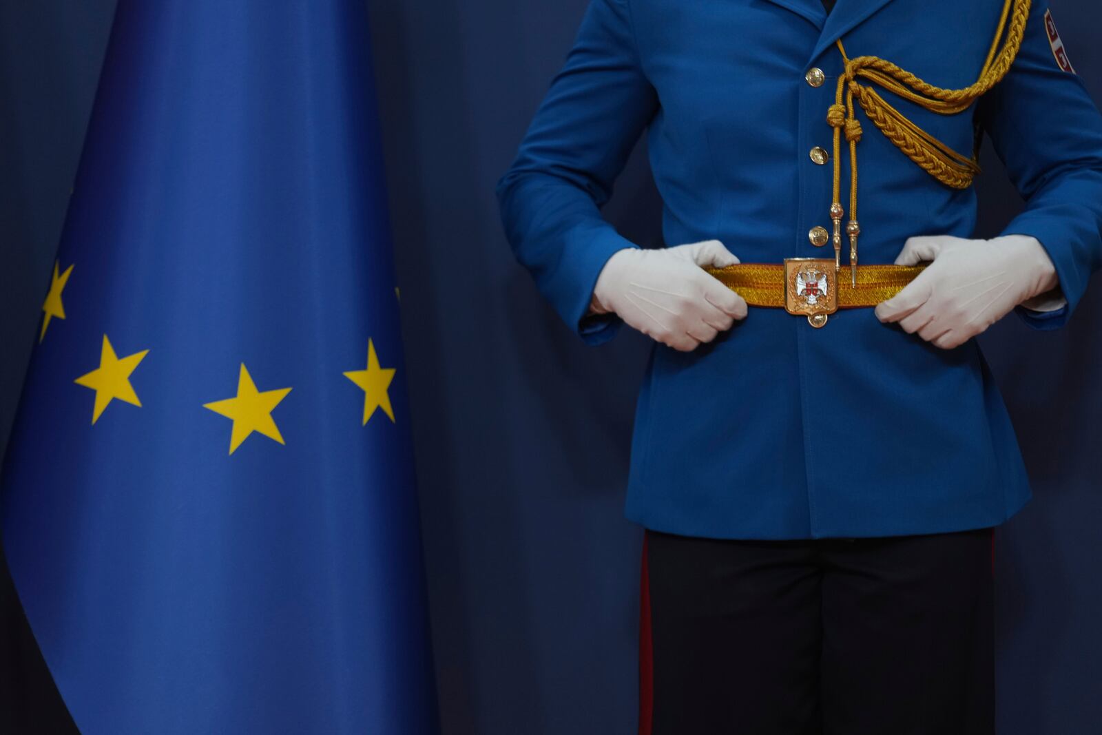 A member of the Serbian honour guard prepares for a press conference of European Council President Antonio Costa and Serbian President Aleksandar Vucic at the Serbia Palace in Belgrade, Serbia, Tuesday, May 13, 2025. (AP Photo/Darko Vojinovic)