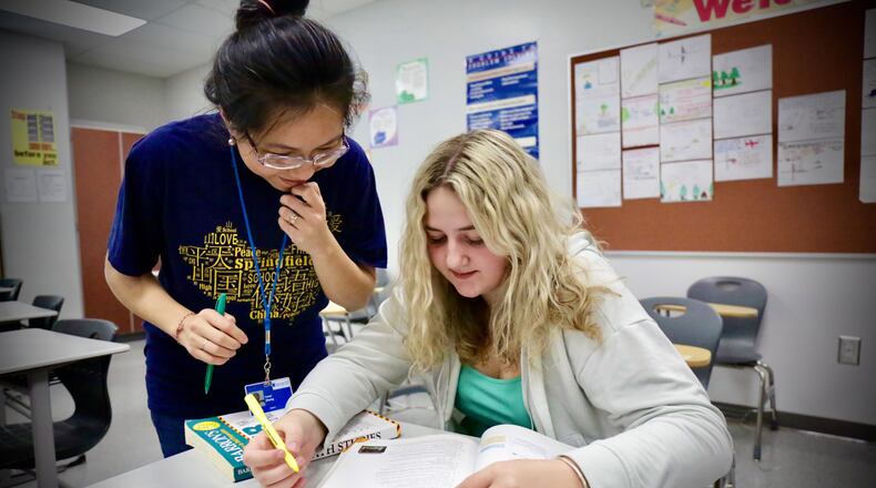A 2022 Springfield High School graduate in the International Baccalaureate (IB) program with IB math teacher Zoe Zhong. Contributed