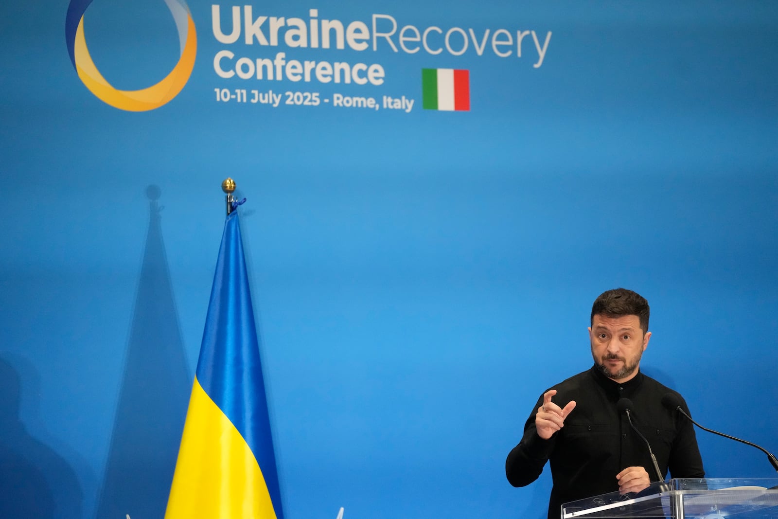 Ukraine's President Volodymyr Zelenskyy speaks with reporters during the Ukraine Recovery Conference at La Nuvola convention center in Rome, Thursday, July 10, 2025. (AP Photo/Gregorio Borgia)